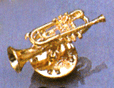 Pin trompeta color oro